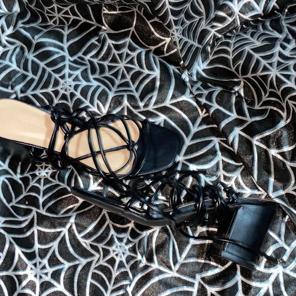 Laces up 1 inche heel